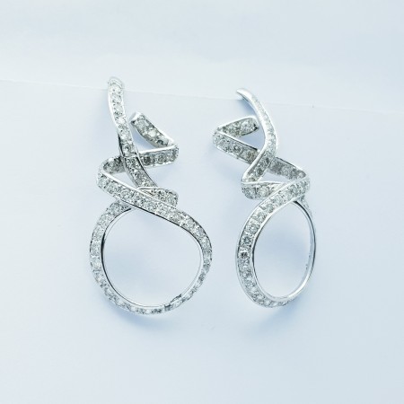 Earrings with diamonds in 18 kt White Gold - model (ribbons)