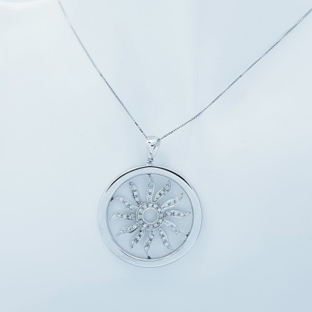 Sun pendant in 18 kt gold with diamonds