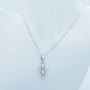 CROSS PENDANT IN 18 KT WHITE GOLD