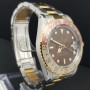 Rolex GMT-Master 40mm Tiger eye Très bon état acier et or Diam1007