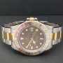 Rolex GMT-Master 40mm Tiger eye Très bon état acier et or Diam1007