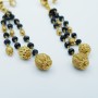 Boucles d'oreilles en or jaune 18 kt et onyx