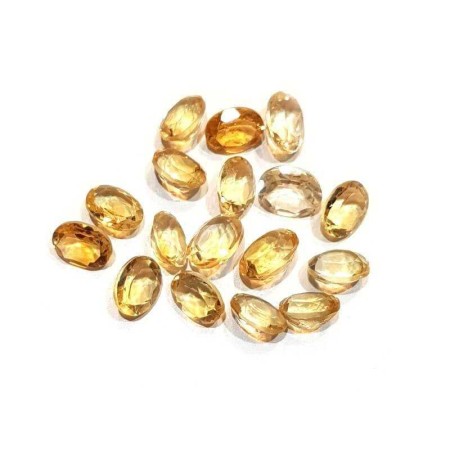 Citrine jaune ovale 7,71 carats 14,78 X 11,34 mm