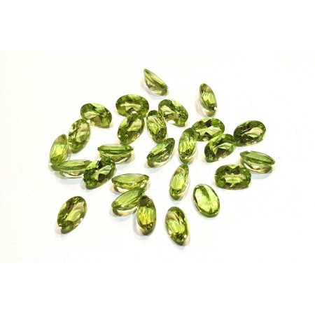 PÉRIDOT OVALE COUPÉ 6X4 mm (0.50 CARAT