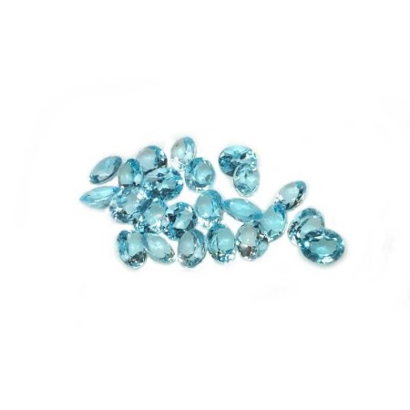 TOPAZE BLEUE COUPE OVALE 7 X 5 POIDS 0.90 CARATS
